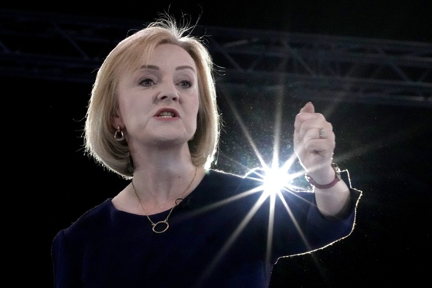 FILE - Liz Truss addresses Conservative Party members during a Conservative leadership election hustings at Wembley Arena in London, Wednesday, Aug. 31, 2022 before becoming Britain's new Prime Minist ...