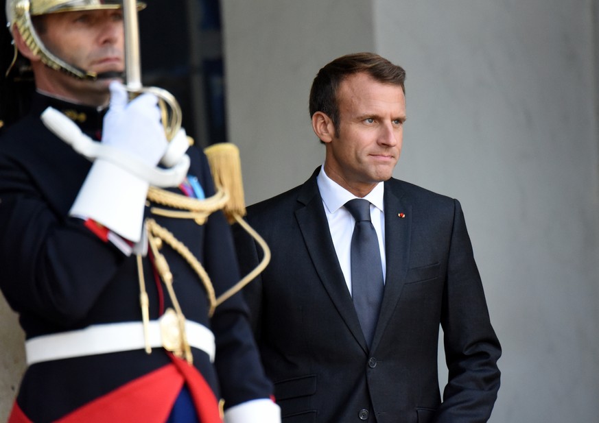 French President Emmanuel Macron welcomes Palestinian president Mahmoud Abbas prior to their meeting at the Elysee Palace, on Septembre 21, 2018 in Paris, France. Photo by Alain Apaydin/ABACAPRESS.COM ...