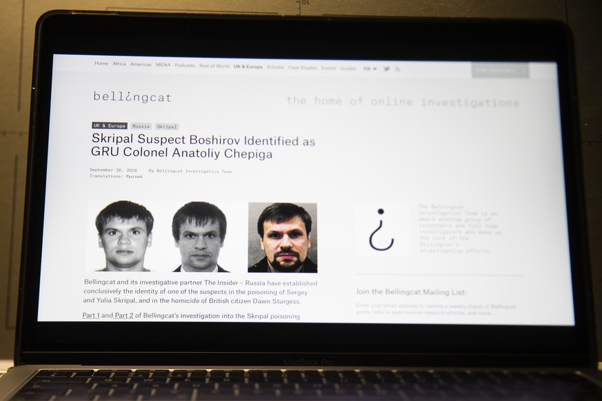A web site of the British investigative group Bellingcat is seen on a computer screen in Moscow, Russia, Thursday, Sept. 27, 2018. An investigative group in Britain named Bellingcat said one of the tw ...