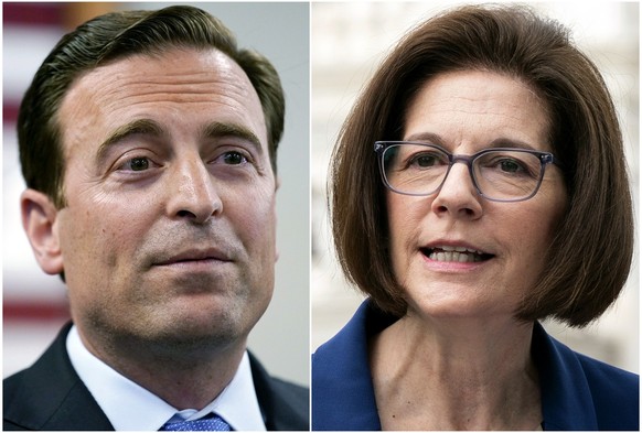 FILE - This combination of photos shows Nevada Republican Senate candidate Adam Laxalt speaking on Aug. 4, 2022, in Las Vegas, left, and Sen. Catherine Cortez Masto, D-Nev., speaking on April 26, 2022 ...