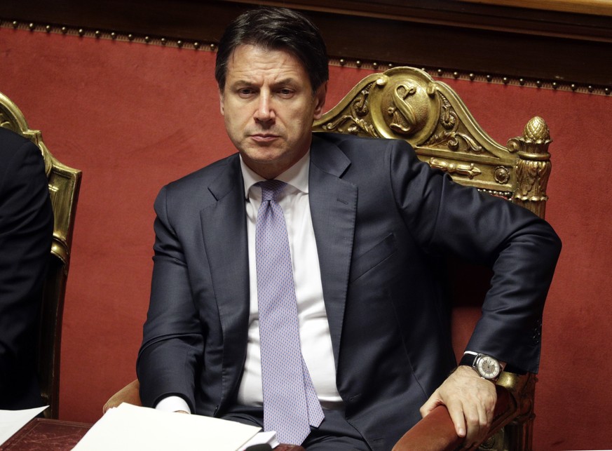 Italian Premier Giuseppe Conte addresses the Senate in Rome, Tuesday, July 24, 2019. Conte has reiterated his trust in Matteo Salvini, his interior minister and head of the League party, addressing pa ...