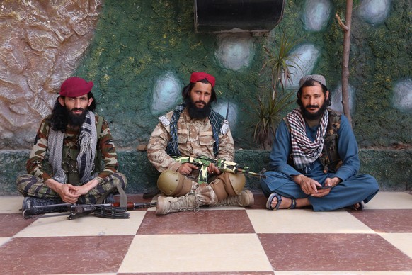 NANGARHAR, AFGHANISTAN - MAY 28: Armed Taliban members are seen in front of the governor's office as daily life continues in Jalalabad, Nangarhar, Afghanistan on May 28, 2022. Bilal Guler / Anadolu Ag ...