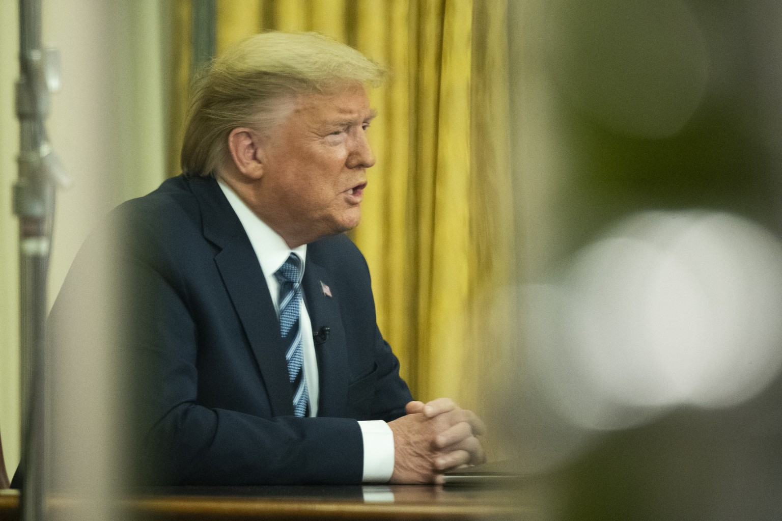 President Donald Trump addresses the nation from the Oval Office at the White House, Wednesday, March 11, 2020, in Washington. (AP Photo/Manuel Balce Ceneta)