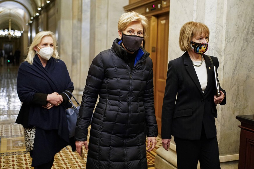 Senators Kirsten Gillibrand D-NY, Elizabeth Warren D-MA and Maggie Hassan D-NH depart after the day s proceedings concluded in the impeachment trial of former U.S. President Donald Trump, on charges o ...
