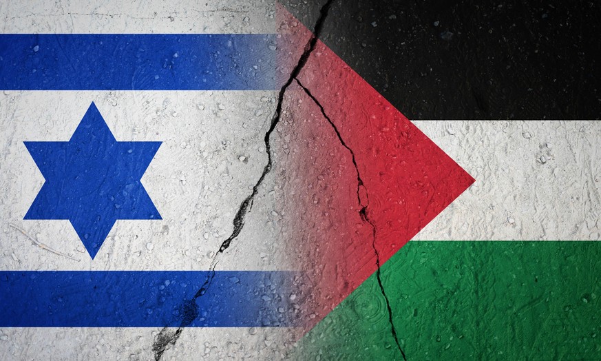 16 may 2021: israel and palestine conflict - israeli and palestine flag broken - symbol of war