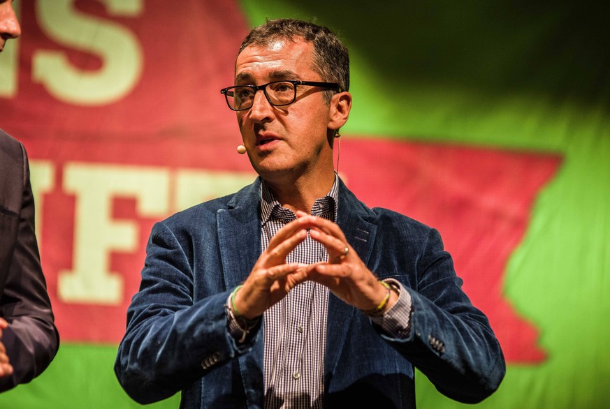 October 4, 2018 - Munich, Bavaria, Germany - CEM OEZDEMIR (o zdemir), co-head of the German Green Party during an appearance in Munich with LUDWIG HARTMANN. The co-head of the German Green Party die G ...