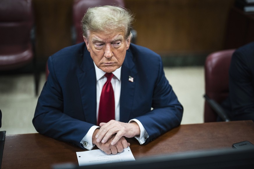 FILE - Former President Donald Trump is pictured in a Manhattan criminal court ahead of the start of jury selection in New York on April 15, 2024. The first day of Trump&#039;s history-making trial in ...
