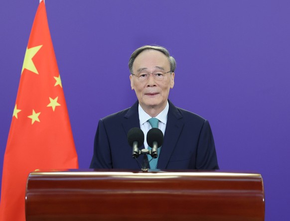 220921 -- BEIJING, Sept. 21, 2022 -- Chinese Vice President Wang Qishan makes a keynote speech while attending the commemorative event for the International Day of Peace 2022 via video link on Sept. 2 ...