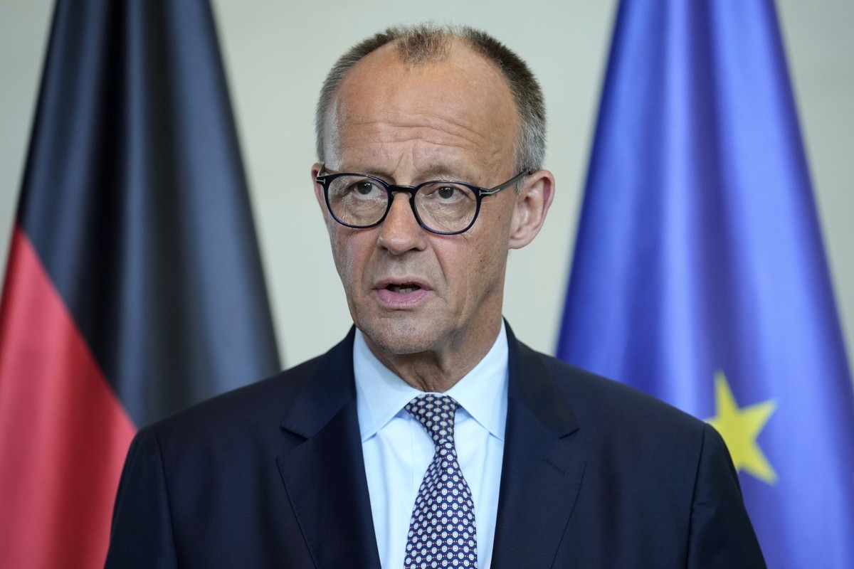 German Chancellor Friedrich Merz attends a joint press statement with Ukrainian President Volodymyr Zelenskyy following talks with European and U.S. leaders in Berlin, Germany, Wednesday, Aug. 13, 202 ...
