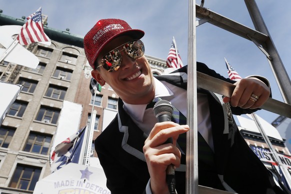 Milo Yiannopoulos address the crowd during the Straight Pride Parade in Boston, Saturday, Aug. 31, 2019. Several dozen marchers and about as many counter-demonstrators have gathered in Boston for a &q ...