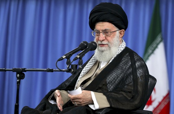 In this picture released by an official website of the office of the Iranian supreme leader, Supreme Leader Ayatollah Ali Khamenei speaks in a meeting in Tehran, Iran, Monday, Aug. 13, 2018. Khamenei ...