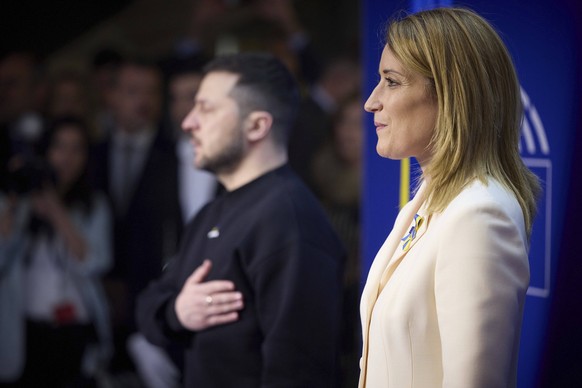 February 9, 2023, Brussels, Belgium: Ukrainian President Volodymyr Zelenskyy, left, and European Parliament President Roberta Metsola right, stand for the national anthems during the arrival ceremony  ...