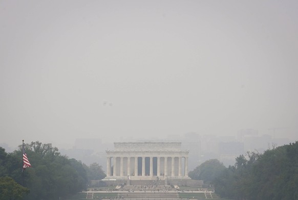 News: SCOTUS OPINIONS Jun 29, 2023 Washington, D.C., USA The Lincoln Memorial is seen in the distance with Arlington, VA seen across the Potomac River through hazy, smoke-filled sky in Washington, DC  ...