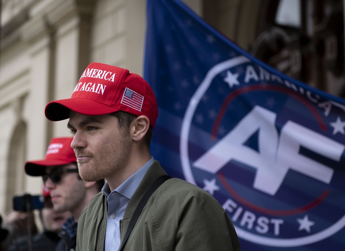 FILE - Nick Fuentes, far right activist, holds a rally at the Lansing Capitol, in Lansing, Mich., Wednesday, Nov. 11, 2020. (Nicole Hester/Mlive.com/Ann Arbor News via AP, File)