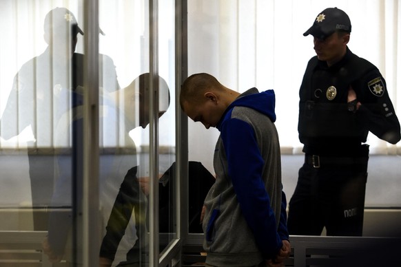 Russian soldier Vadim Shishimarin, 21, suspected of violations of the laws and norms of war, inside a cage during a court hearing, amid Russia&#039;s invasion of Ukraine, in Kyiv, Ukraine May 20, 2022 ...