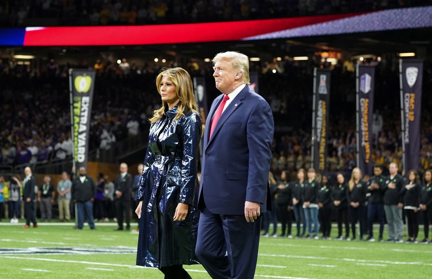 U.S. President Donald Trump and first lady Melania Trump attend the College Football Playoff National Championship game in New Orleans, Louisiana, U.S., January 13, 2020. REUTERS/Kevin Lamarque