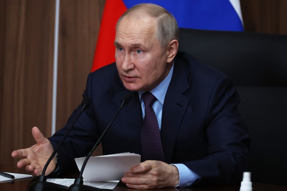 Russian President Vladimir Putin chairs a meeting on the development of unmanned aircraft at the Rudnyovo industrial park in Moscow, Russia, Thursday, April 27, 2023. (Mikhail Klimentyev, Sputnik, Kre ...