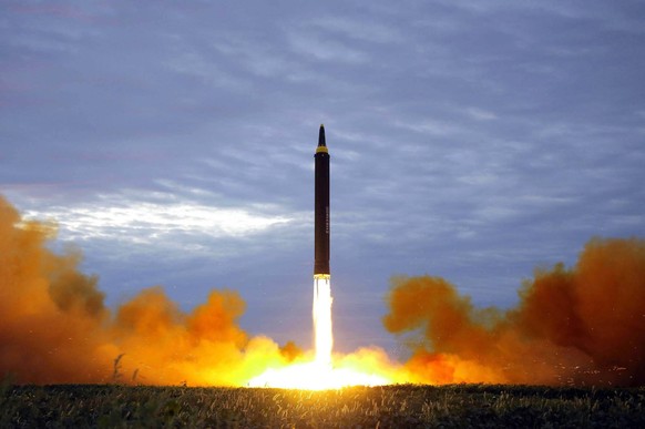 FILE - in this Aug. 29, 2017 file photo distributed on Aug. 30, 2017, by the North Korean government shows what was said to be the test launch of a Hwasong-12 intermediate range missile in Pyongyang,  ...