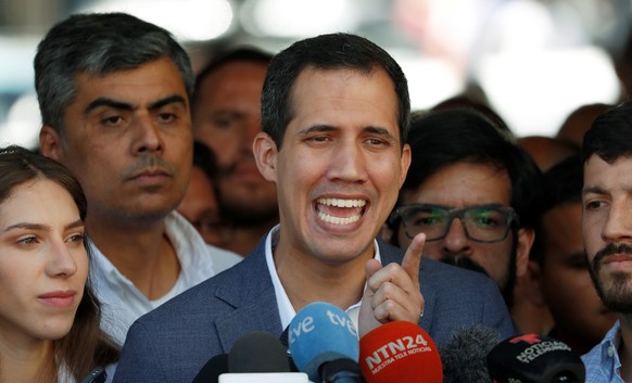Venezuelan opposition leader Juan Guaido, who many nations have recognized as the country&#039;s rightful interim ruler, talks to the media after attending a religious event in Caracas, Venezuela Febr ...