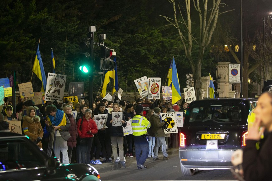 LONDON, UK - FEBRUARY 23: People gather to stage a protest against Russia in front of the Russian Embassy in London, United Kingdom on February 23, 2022. Rasid Necati Aslim / Anadolu Agency