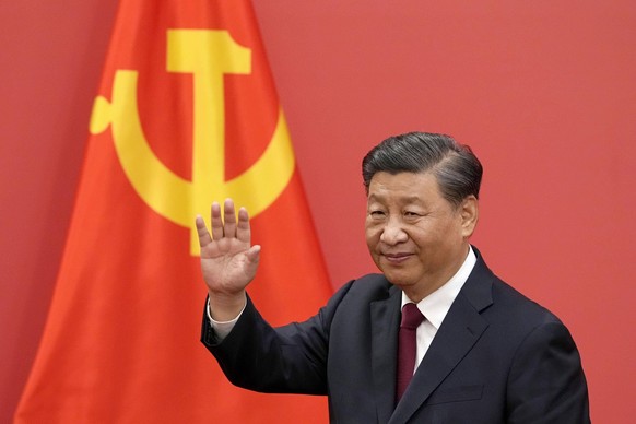 China s Xi launches new leadership Chinese President Xi Jinping waves to reporters from the podium at the Great Hall of the People on Oct. 23, 2022, a day after the conclusion of the Chinese Communist ...