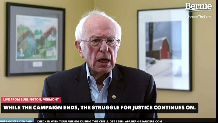 Democratic U.S. Presidential candidate Senator Bernie Sanders announces to supporters that he is suspending his campaign for the Democratic presidential nomination in a livestream broadcast from his h ...