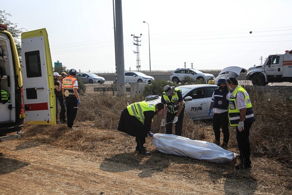 The death toll of Israelis rises to 600 after Operation Al-Aqsa SDEROT, ISRAEL: Police officers carry a body bag as they find a dead body in a car after Hamas launched Operation Al-Aqsa Flood in Sdero ...