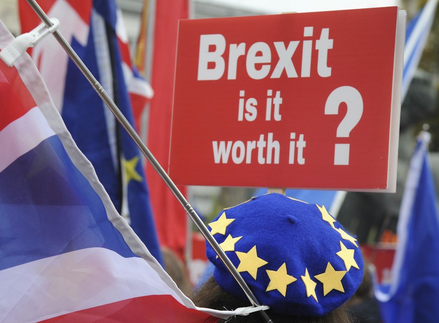 Demonstrators protest against Brexit as the governing Conservative Party start their annual four-day party conference in Birmingham, England, Sunday Sept 30, 2018. The lack of party unity over Brexit  ...