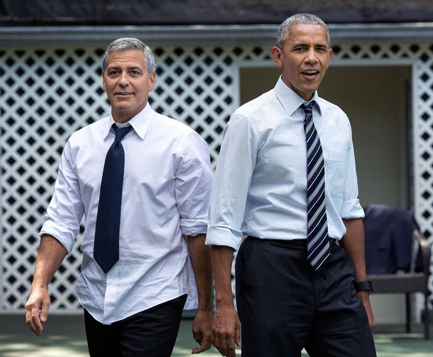 September 12, 2016 - Washington, United States - Actor George Clooney (left) and U.S. President Barack Obama play basketball at the White House September 12, 2016 in Washington, DC. Washington United  ...