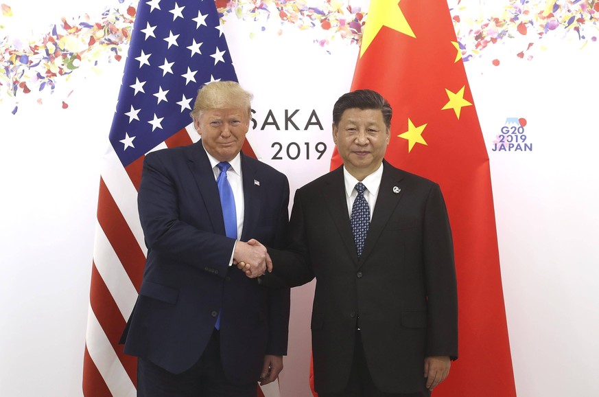 OSAKA, JAPAN - JUNE 29: Chinese President Xi Jinping R shakes hands with US President Donald Trump before a bilateral meeting during the G20 Summit on June 29, 2019 in Osaka, Japan. PUBLICATIONxINxGER ...