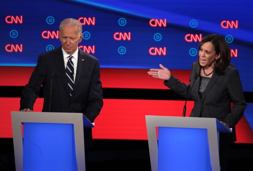 DETROIT, MICHIGAN - JULY 31: Democratic presidential candidate Sen. Kamala Harris (D-CA) (R) speaks while former Vice President Joe Biden listens during the Democratic Presidential Debate at the Fox T ...