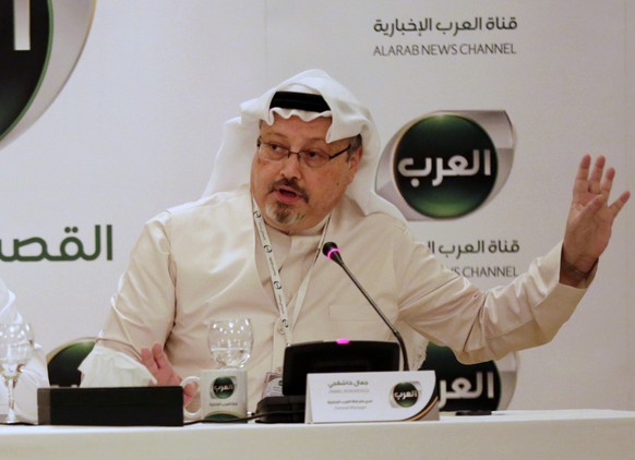 FILE - In this Dec. 15, 2014 file photo, Jamal Khashoggi, then general manager of a new Arabic news channel speaks during a press conference, in Manama, Bahrain. Khashoggi was a Saudi insider. He rubb ...