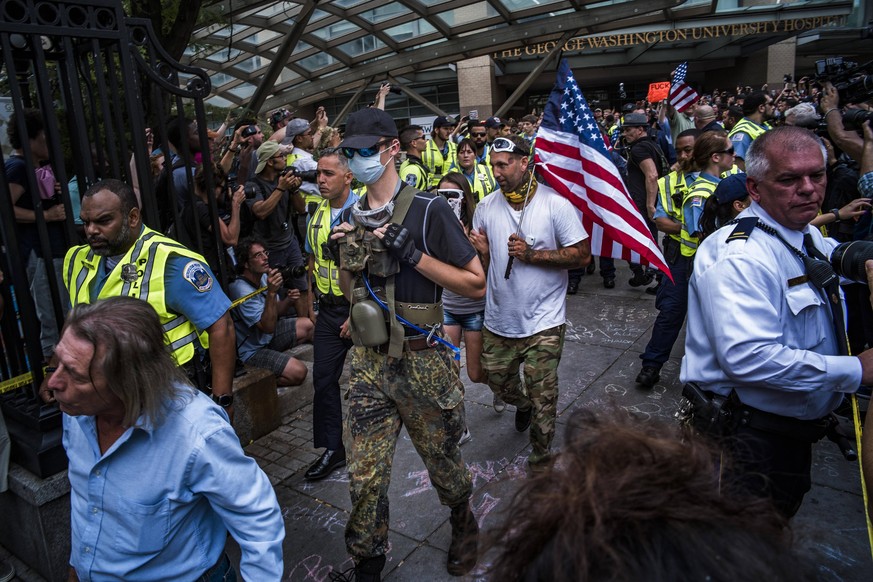 August 12, 2018 - Washington, District of Columbia, U.S. - Police secured the area for Unite the Right rally attendees who would emerge from the Foggy Bottom Metro station. At the Unite the Right rall ...