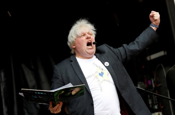 A man resembling politician Boris Johnson addresses an anti-Brexit demonstration on the first day of the Conservative Party Conference in Birmingham, Britain, September 30, 2018. REUTERS/Darren Staple ...