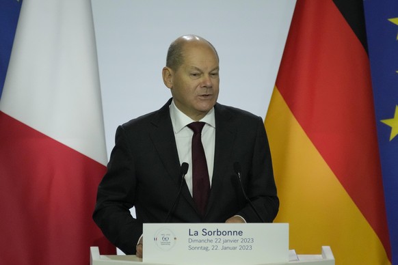 German Chancellor Olaf Scholz delivers his speech at the Sorbonne University during a ceremony to mark 60 years since a landmark treaty sealed a bond between the longtime enemies, Sunday, Jan. 22, 202 ...