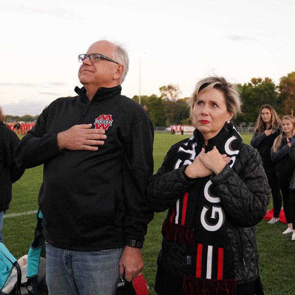 September 25, 2018 - Mankato, MN, USA - Gubernatorial candidate Tim Walz and his wife Gwen stood for the National Anthem at the start of their daughter Hope s soccer game Tuesday, Sept. 25, 2018 at th ...