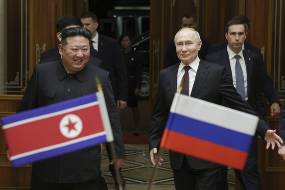 FILE - Russian President Vladimir Putin, right, and North Korea&#039;s leader Kim Jong Un smile during their meeting at the Pyongyang Sunan International Airport outside Pyongyang, North Korea, on Jun ...