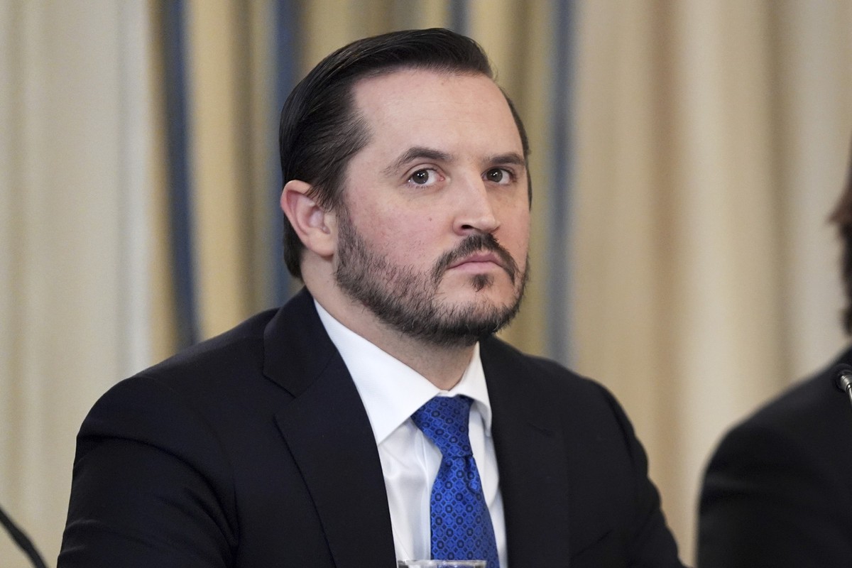 White House Deputy Chief of Staff Taylor Budowich listens during an &quot;Invest in America&quot; roundtable with President Donald Trump and business leaders at the White House, Monday, June 9, 2025,  ...