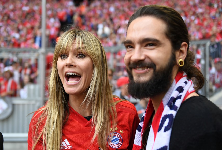 Soccer Football - Bundesliga - Bayern Munich v Eintracht Frankfurt - Allianz Arena, Munich, Germany - May 18, 2019 Heidi Klum and Tom Kaulitz before the match REUTERS/Andreas Gebert DFL regulations pr ...