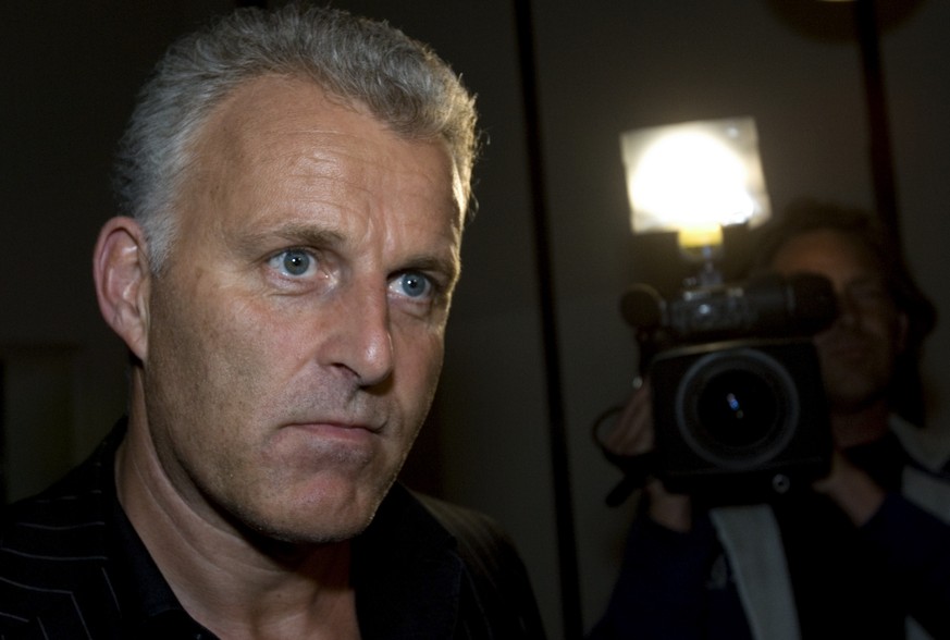 FILE - In this Thursday Jan. 31, 2008 file photo, Dutch crime reporter Peter R. de Vries arrives for a live TV show in Amsterdam, Netherlands. De Vries, a renowned Dutch crime reporter was shot last w ...