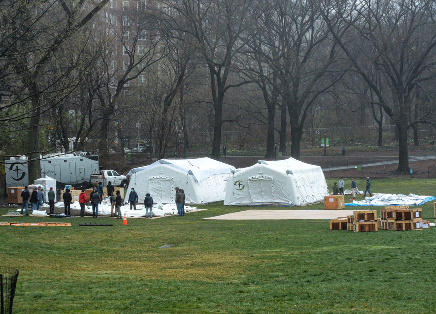 March 29, 2020, New York Manhattan, USA: NYC building the first makeshift Hospital in Central Park a Cross street from Mount Sinai Hospital. 03/29/20. New York Manhattan. 100 ST and 5 AV Central Park  ...