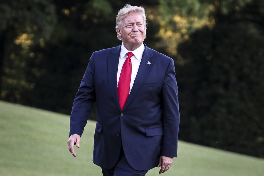 June 30, 2019 - Washington, District of Columbia, U.S. - United States President Donald J. Trump walks on the South Lawn of the White House upon his return to Washington from South Korea on June 30, 2 ...