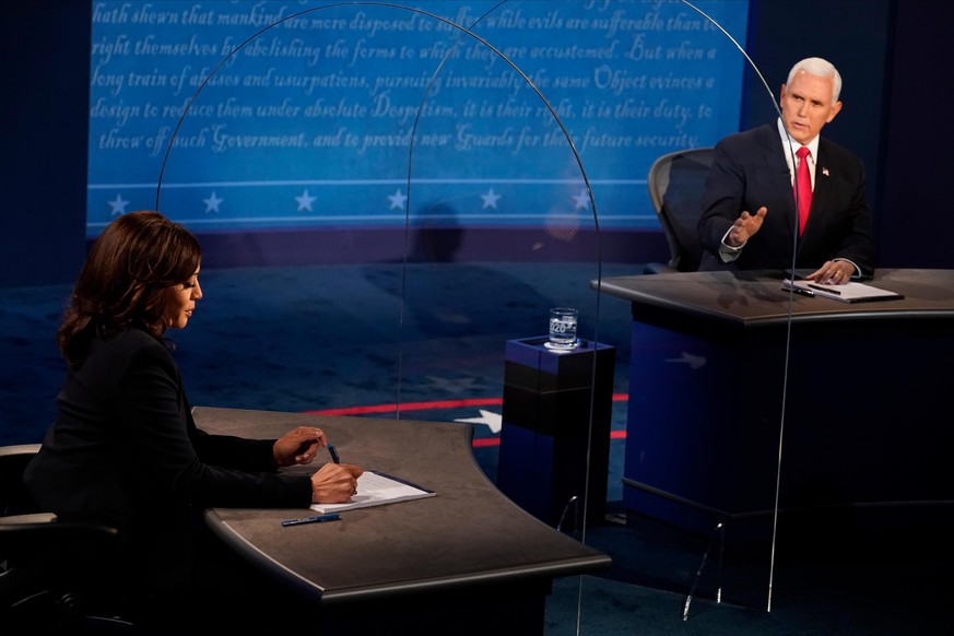 SALT LAKE CITY, UTAH - OCTOBER 07: Democratic vice presidential nominee Sen. Kamala Harris (D-CA) and U.S. Vice President Mike Pence participate in the vice presidential debate at the University of Ut ...