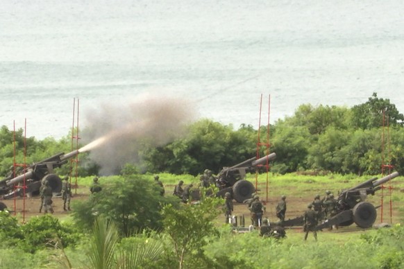 Taiwan's military conducts artillery live-fire drills at Fangshan township in Pingtung, southern Taiwan, Tuesday, Aug. 9, 2022. Taiwan's official Central News Agency reported that Taiwan's army will c ...