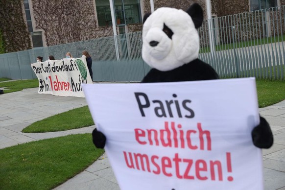 BERLIN, GERMANY - MAY 12: Supporters of the Fridays for Future climate movement demonstrate outside the Chancellery, where earlier in the day the government cabinet met to agree on amendments to Germa ...