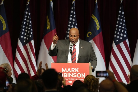 North Carolina Lt. Gov. Mark Robinson, Republican candidate for governor, speaks at an election night event in Greensboro, N.C., Tuesday, March 5, 2024. (AP Photo/Chuck Burton)