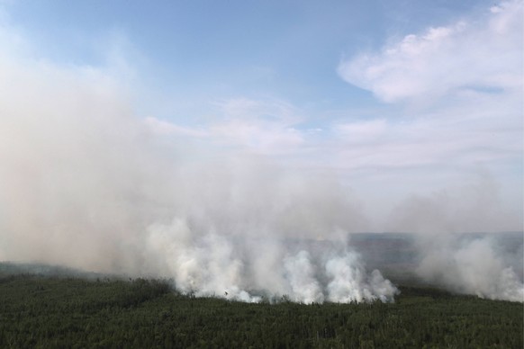 KRASNOYARSK TERRITORY, RUSSIA - AUGUST 4, 2019: A view of a forest fire in Boguchany District; over 1 million hectares of woodland have been hit by wildfires in Russia s Krasnoyarsk Territory. Donat S ...