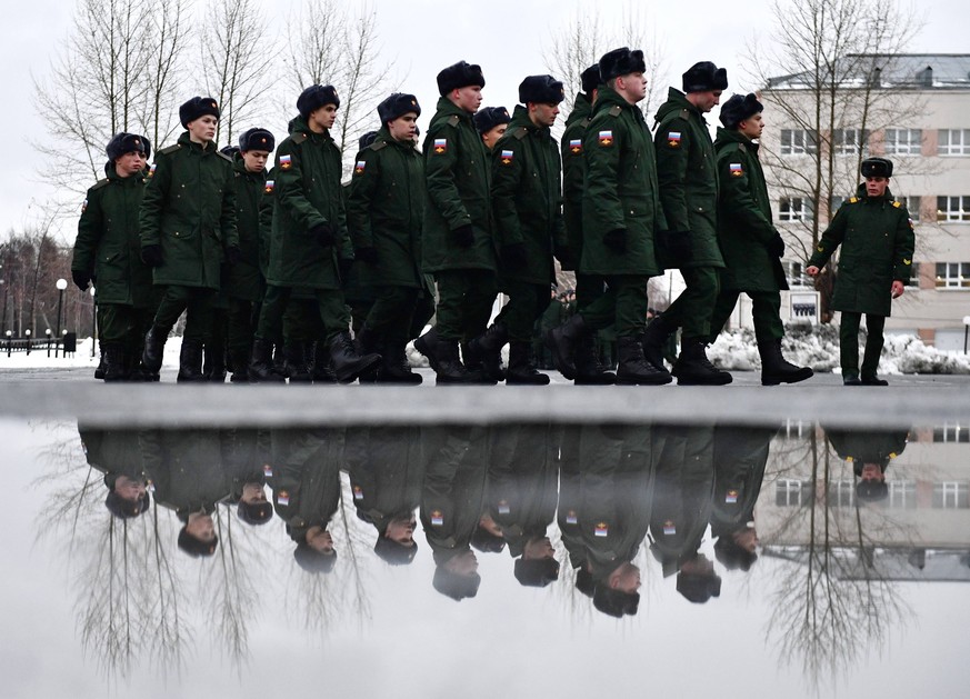 Russia Defence Conscription 8315036 11.11.2022 Young men conscripted for military service in the Russian armed forces march at the regional assembly point while being sent to a military unit, in the t ...