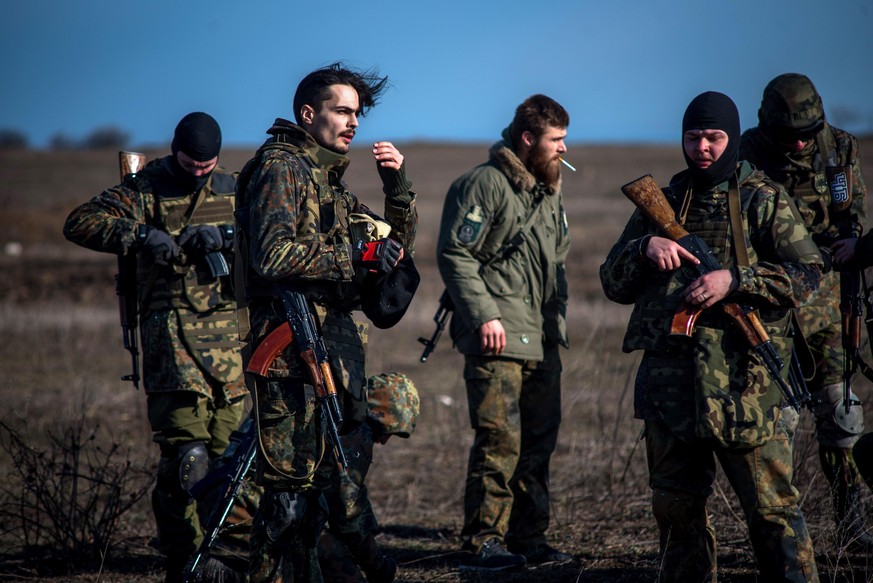 Berdyansk Oblast, Ukraine - March, 7, 2015: Soldiers from Azov Battalion go back to positions after a lecture from their instructor. Photo: James Sprankle/dpa