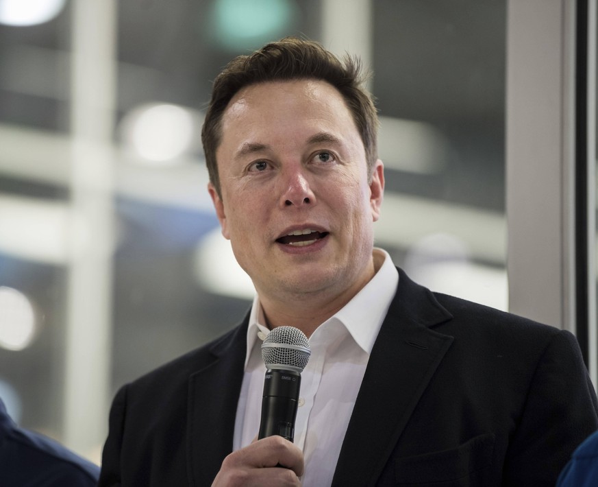 October 10, 2019, Hawthorne, CA, United States of America: SpaceX Founder and CEO Elon Musk speaks to press in front of the Crew Dragon capsule that is being prepared for the Demo-2 mission at SpaceX  ...